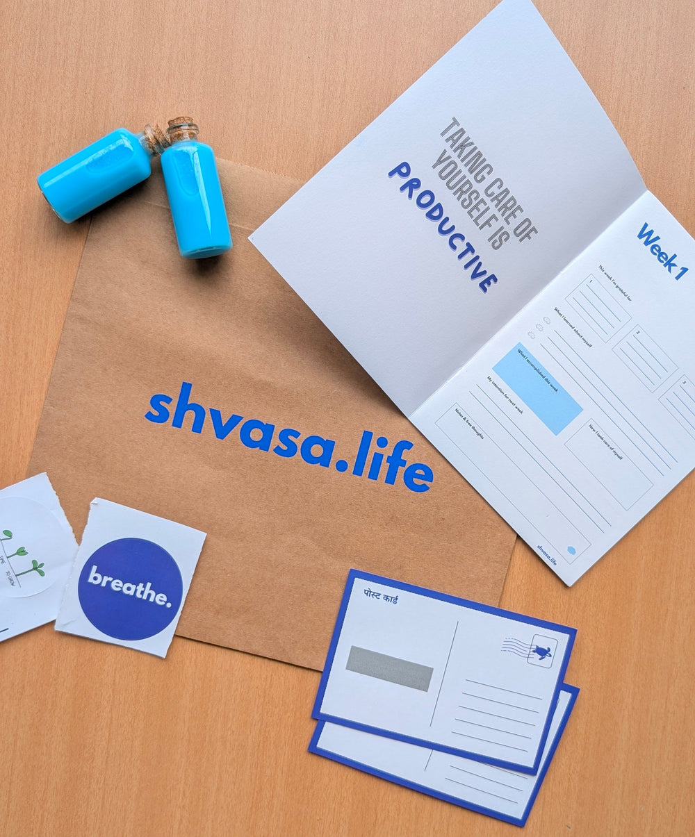 Shvasa.life packaging with product and branded items on a wooden surface


